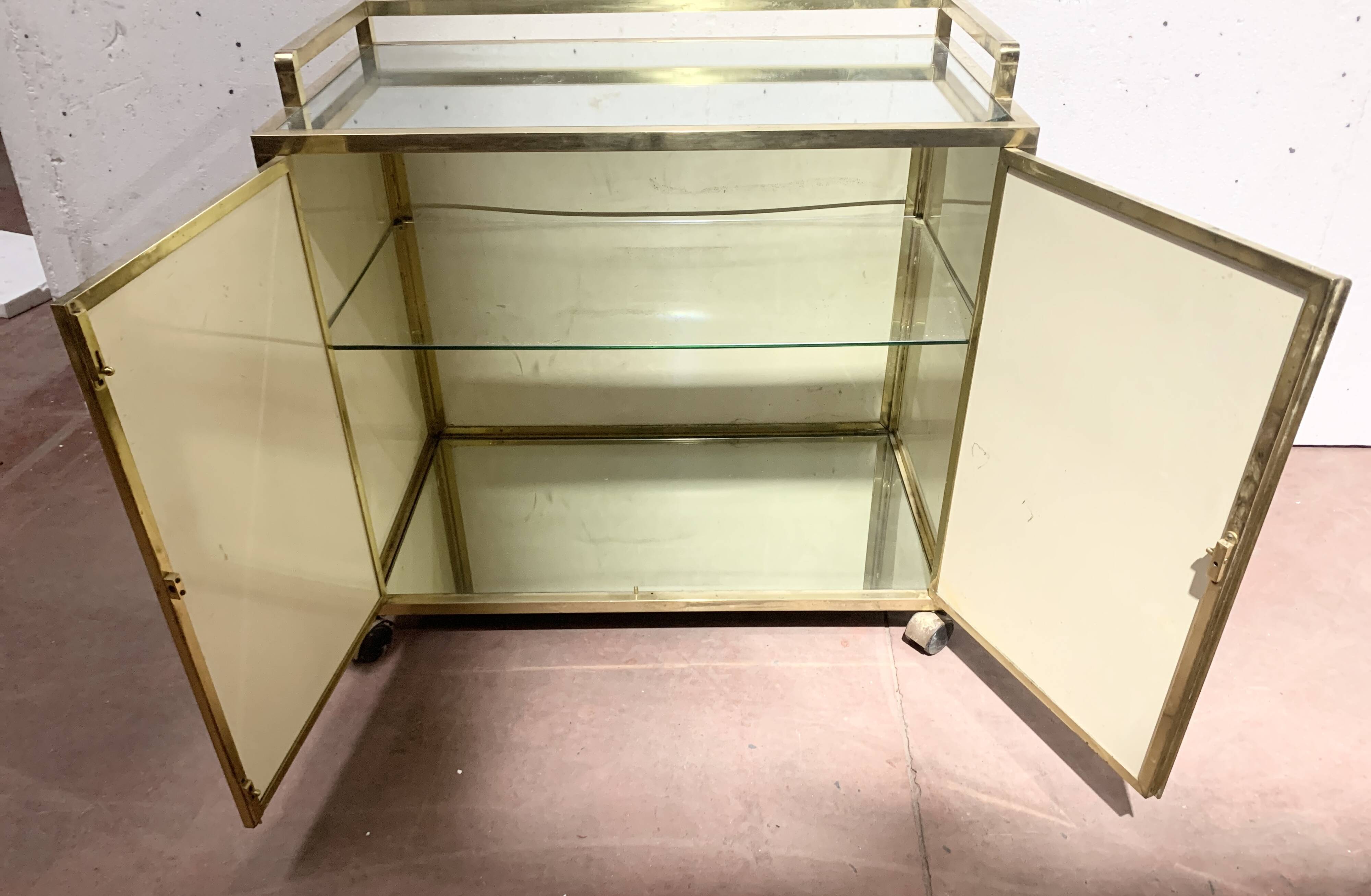 1970s brass bar with a mirrored front from the 20th century.