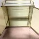 1970s brass bar with a mirrored front from the 20th century.