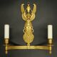 Large pair of wall sconces with winged caryatids in Empire style - gilded bronze