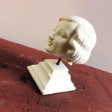 Plaster head of young girl from the 1930s