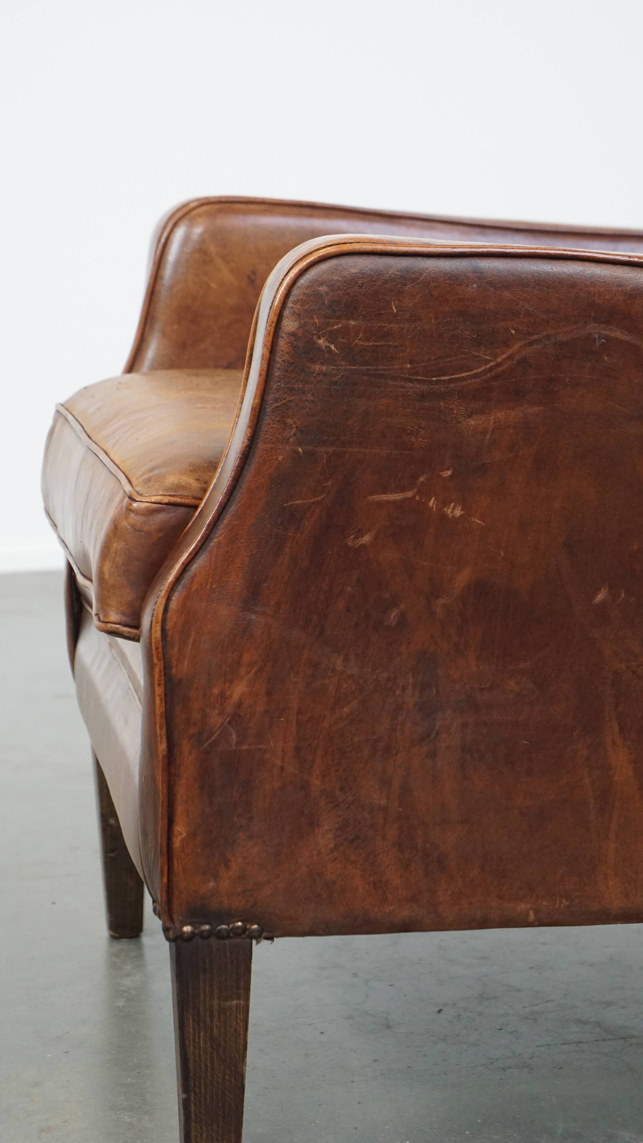Sheepskin armchair with a refined Art Deco design