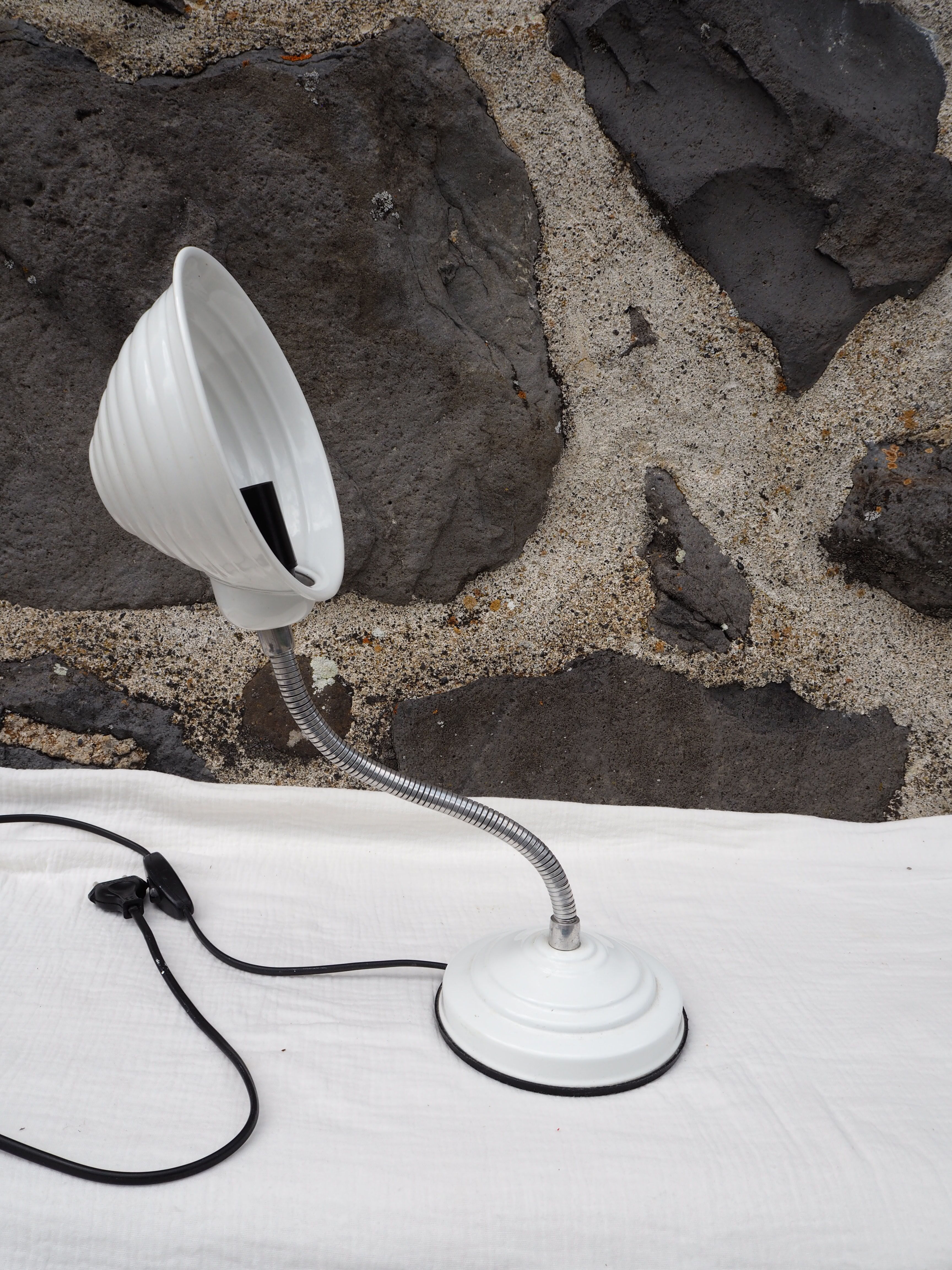 White articulated lamp with metal arm