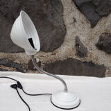 White articulated lamp with metal arm