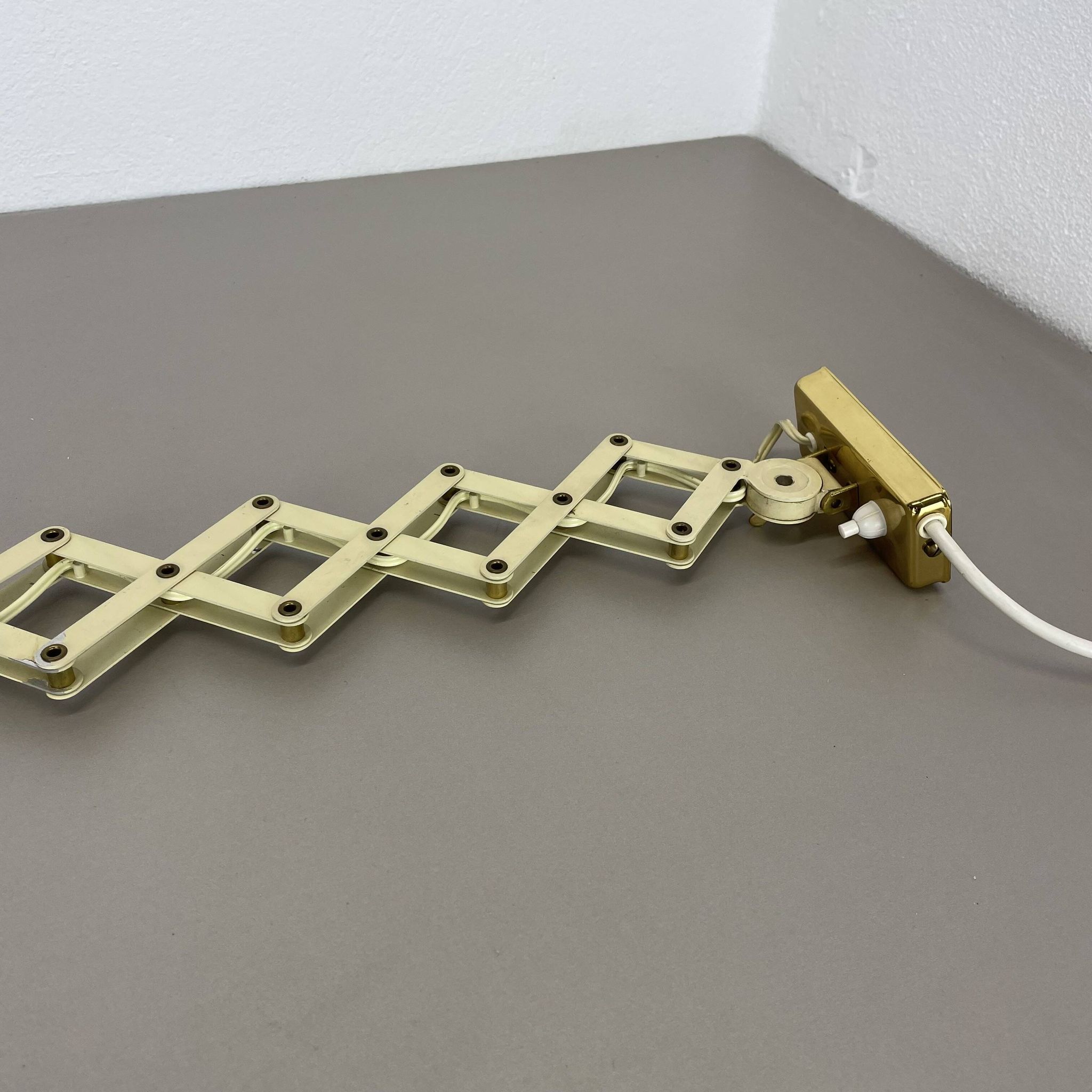 Original brass and metal scissors wall light by SIS Leuchten, Germany, 1950s.