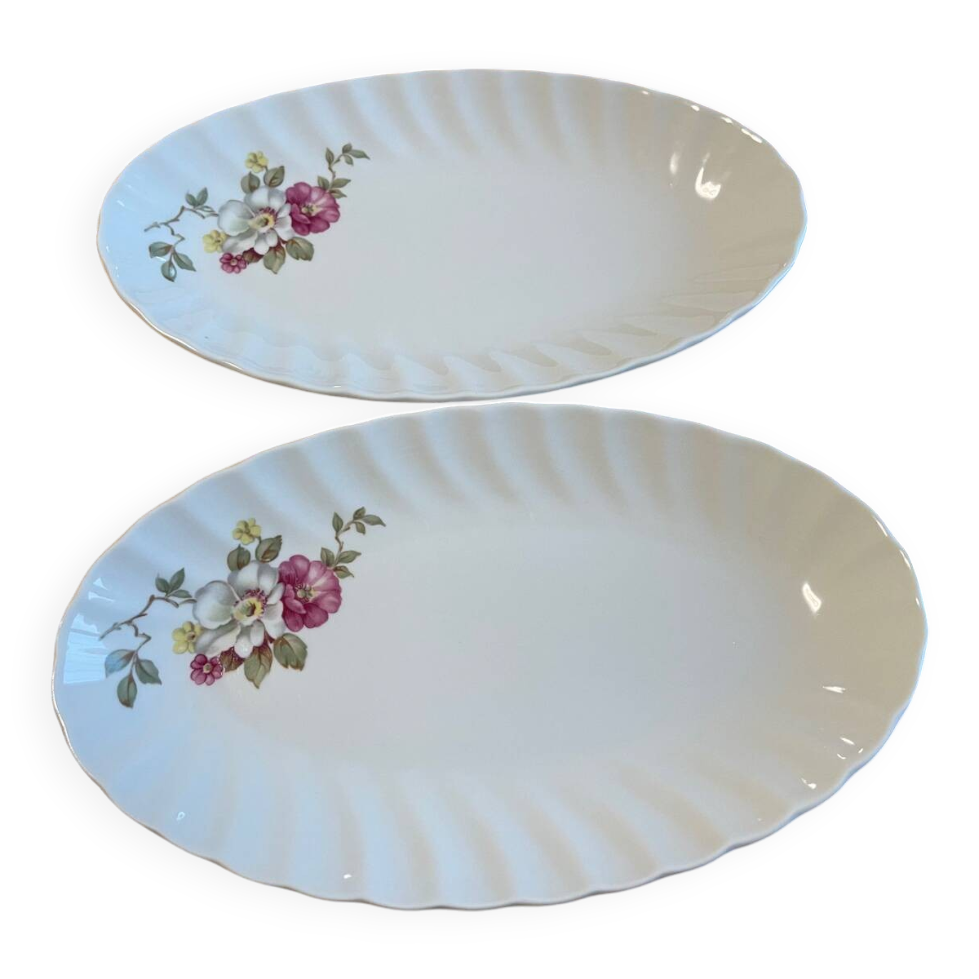 Set of two snake-patterned porcelain dishes.