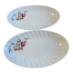 Set of two snake-patterned porcelain dishes.