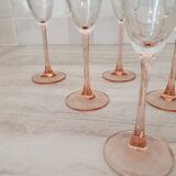 6 champagne flutes with pink stems