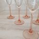 6 champagne flutes with pink stems