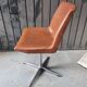 Paire de chaises pivotantes en Skaï cognac marron