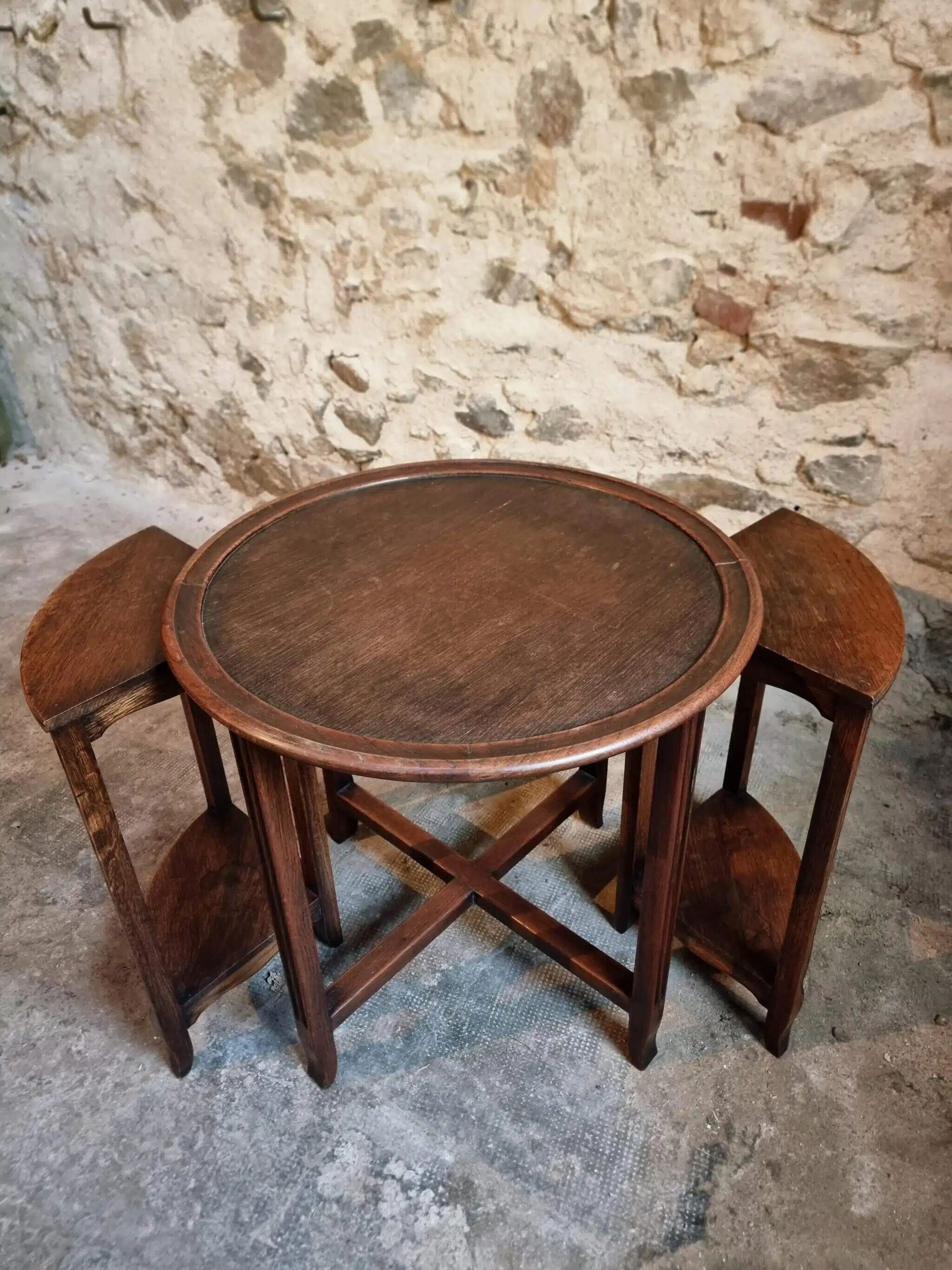 Vintage oak nesting tables set, round coffee table from the 1960s with two integrated side tables.