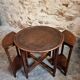 Vintage oak nesting tables set, round coffee table from the 1960s with two integrated side tables.