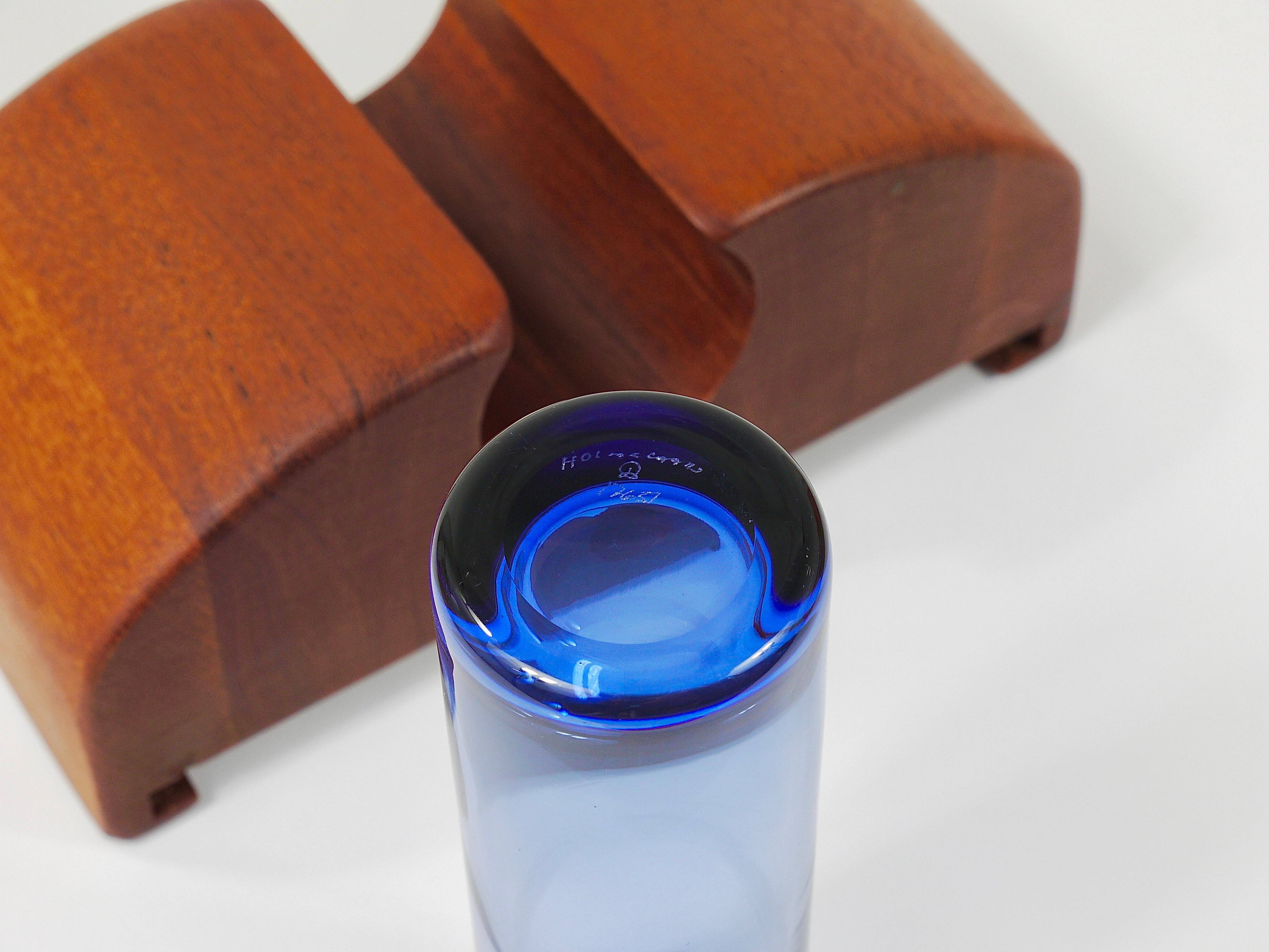 Danish wall mirror by Jacob Hermann & Per Lütken and Holmegaard glass vase, 1960s.