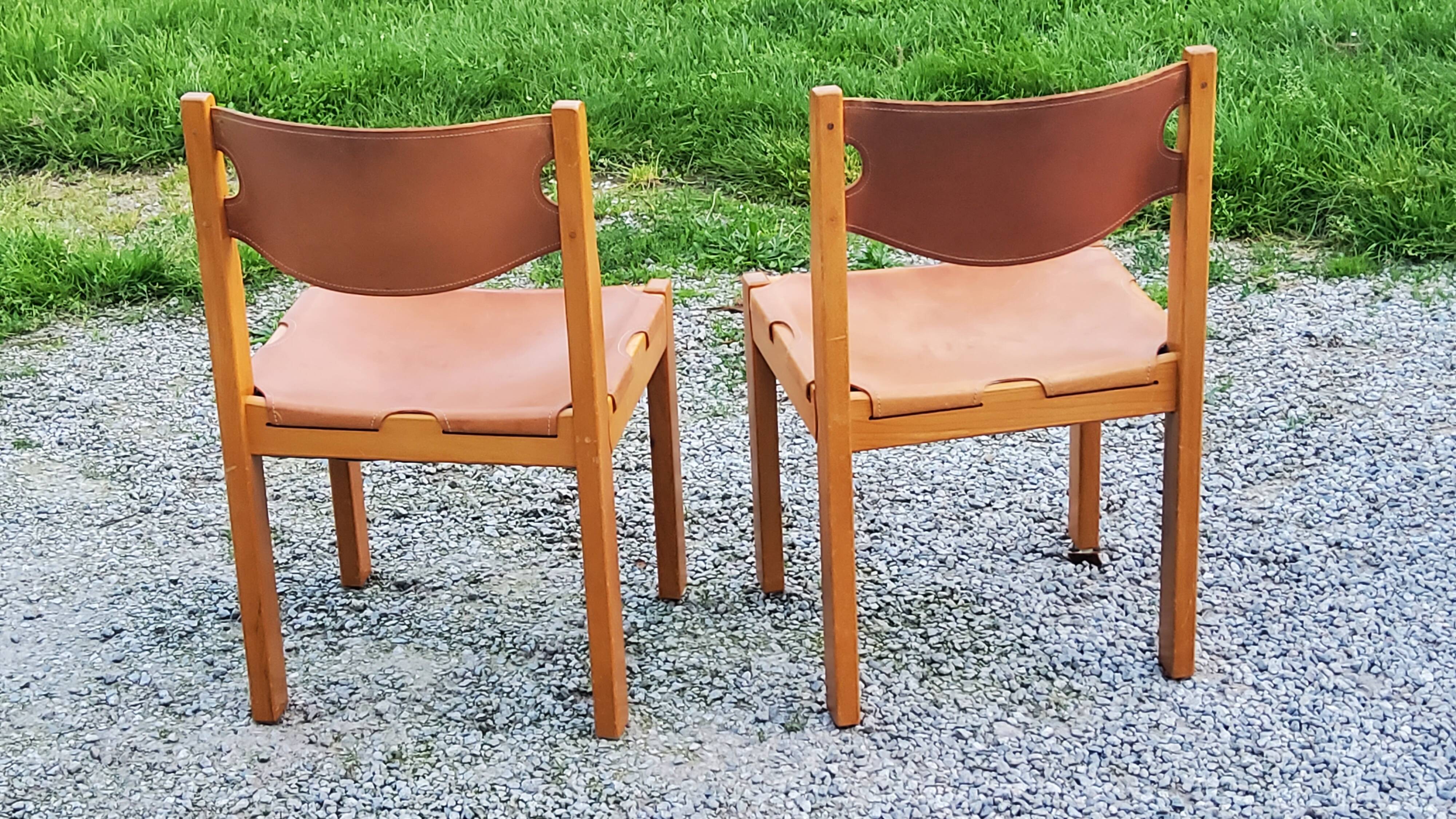 Pair of brutalist chairs in elm and stretched leather with saddle stitching Self publisher