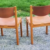 Pair of brutalist chairs in elm and stretched leather with saddle stitching Self publisher