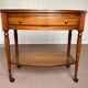 Wooden TV cabinet on casters