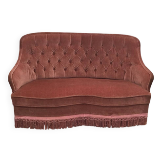 Pale pink tufted back toad sofa