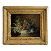 Old oil painting on wood of a bouquet of flowers signed Petit.