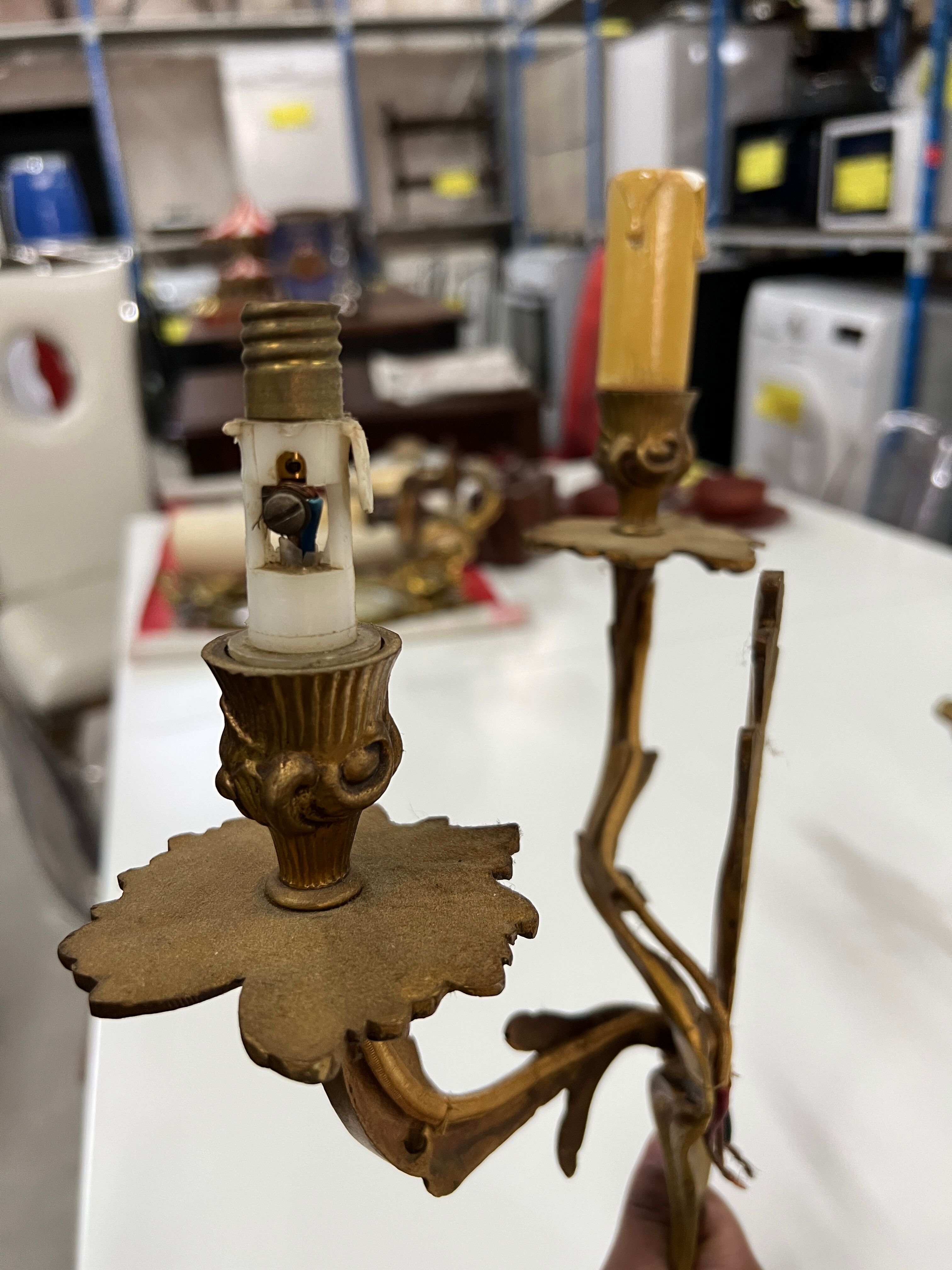 Pair of Louis XV wall lamps in gilded bronze