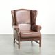 Comfortable cowhide wingback armchair in English style with a timeless look