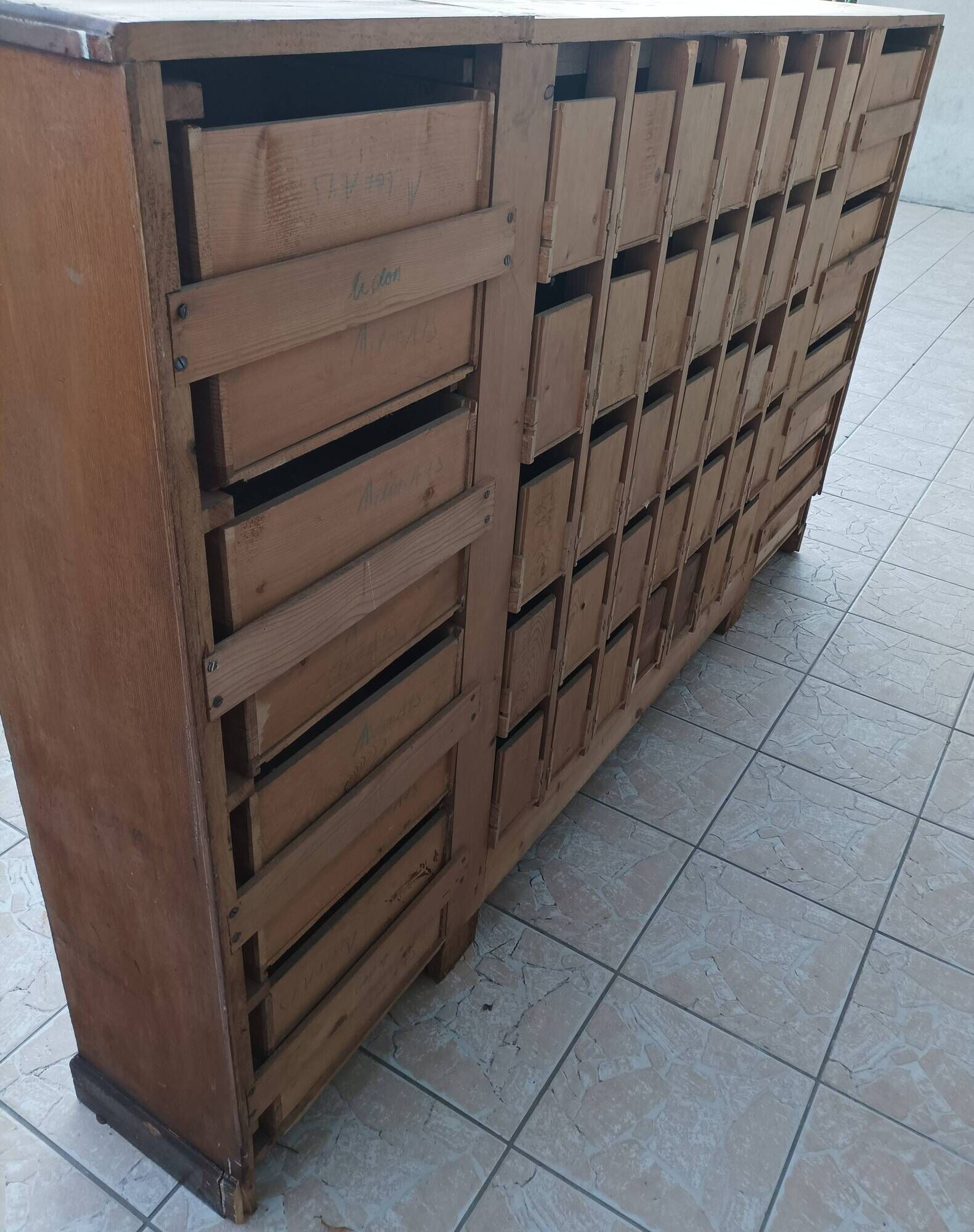 Apothecary or trade cabinet in fir with 53 drawers.