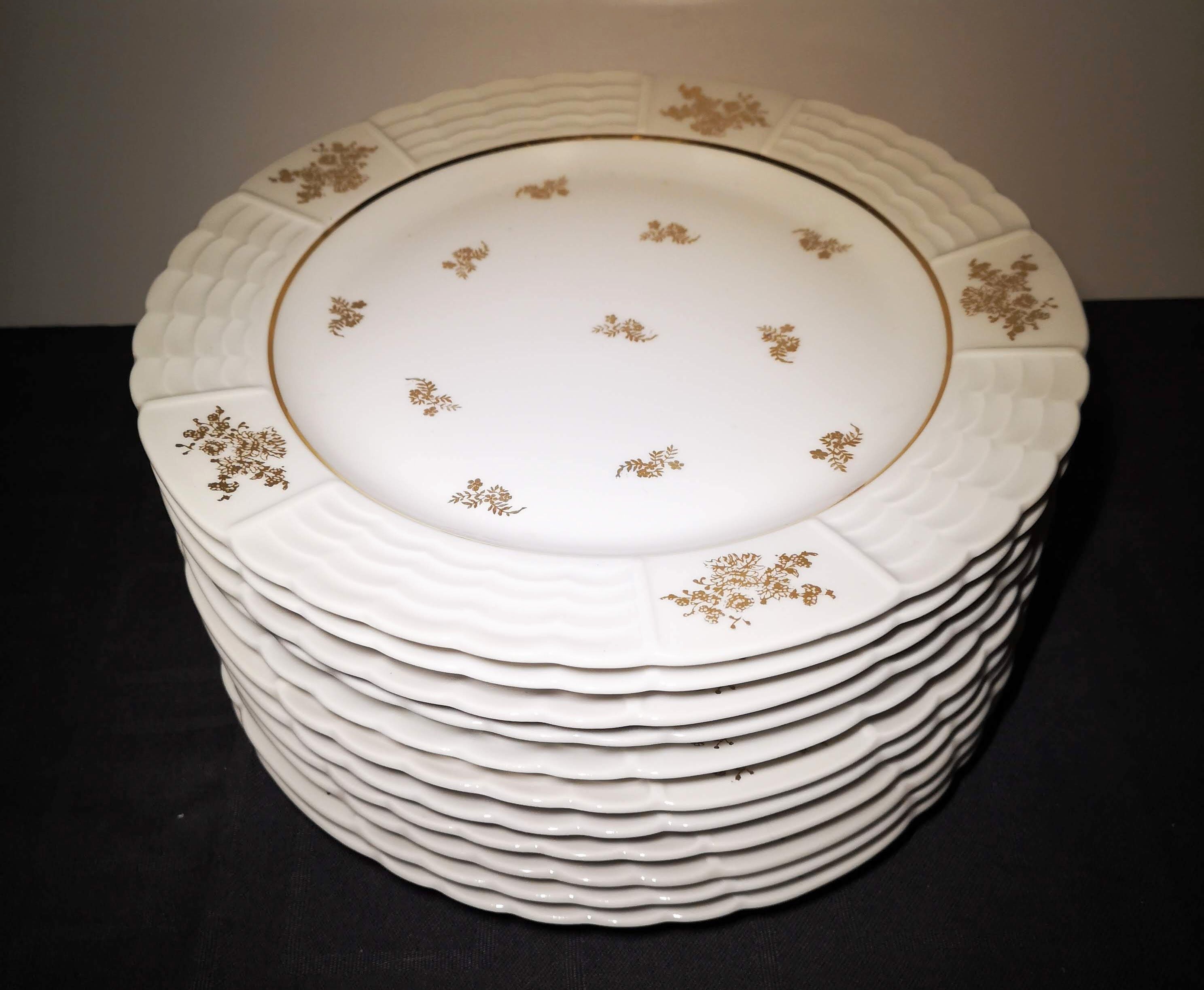 Lot 11 plates flat porcelain art of Limoges