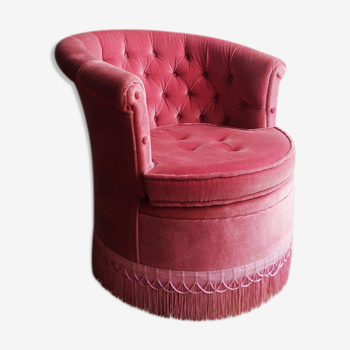 Toad in pink velvet upholstered armchair