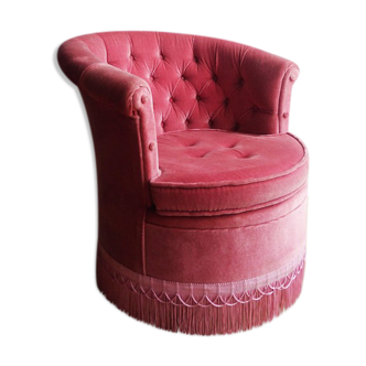 Toad in pink velvet upholstered armchair