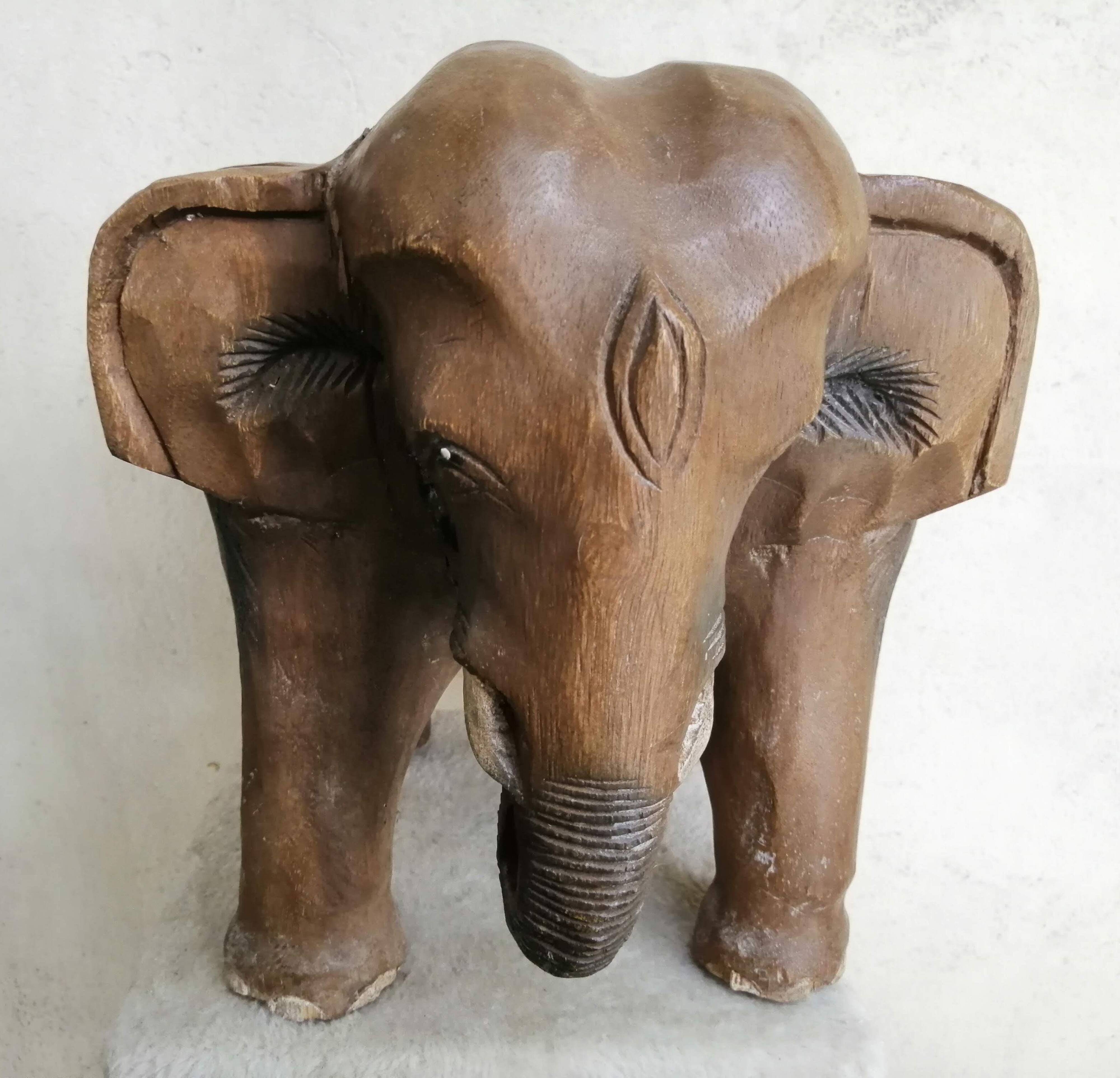 Solid wooden elephant table