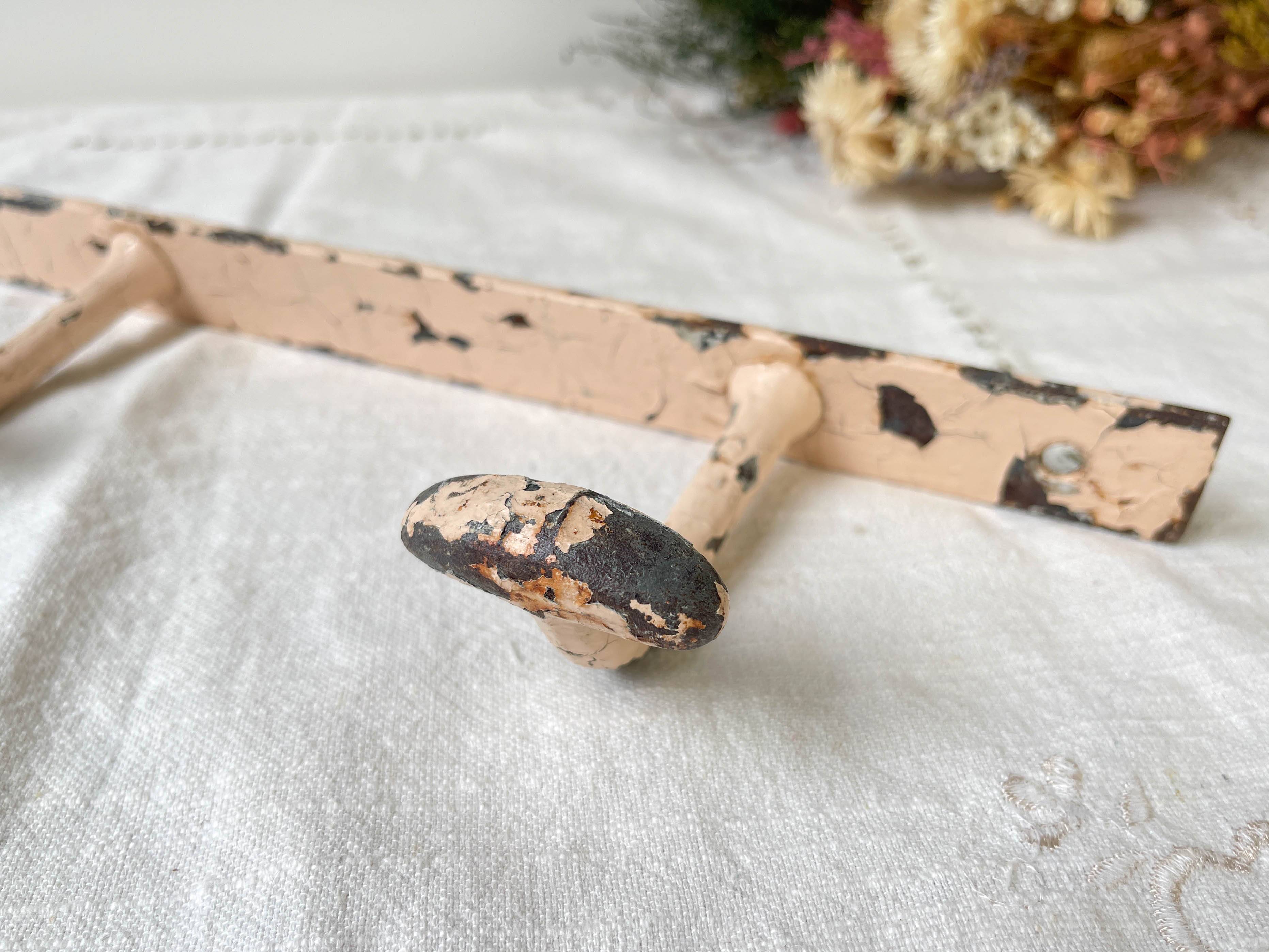 Vintage enameled cast iron wall hook with 3 hooks