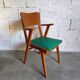 Vintage armchair in skai and wood 60s