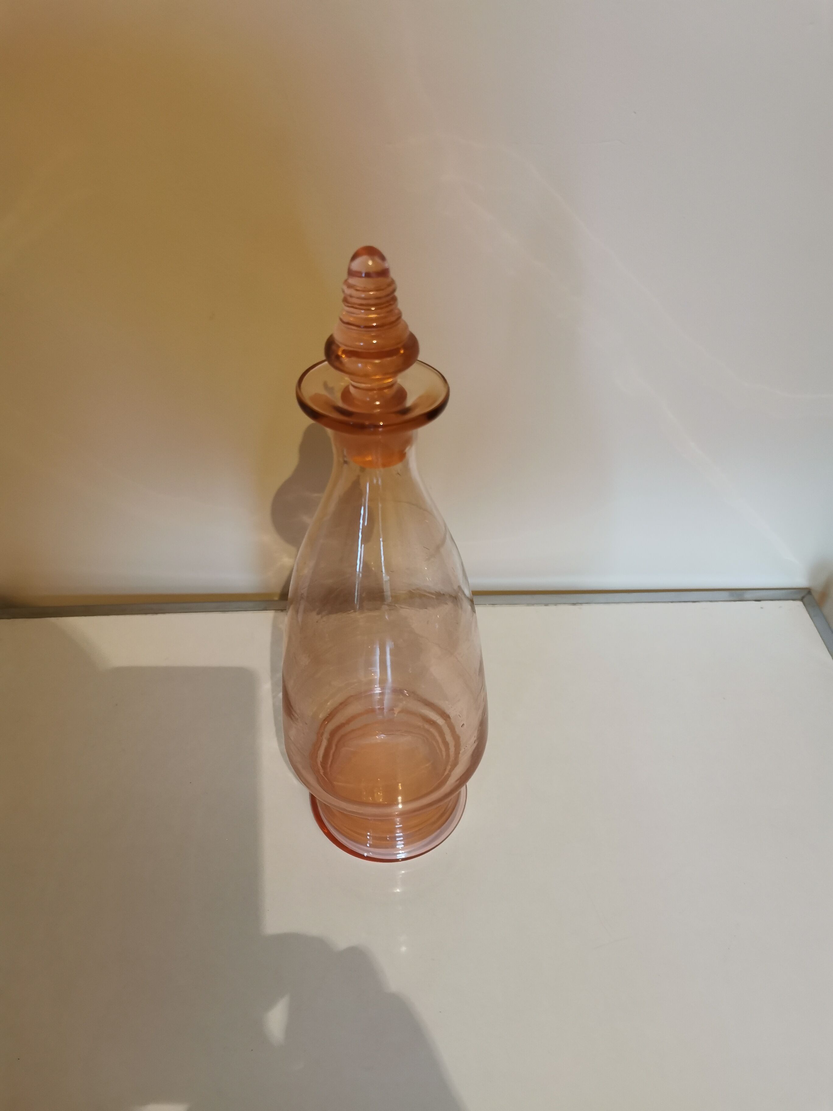 Art deco decanter in pink glass