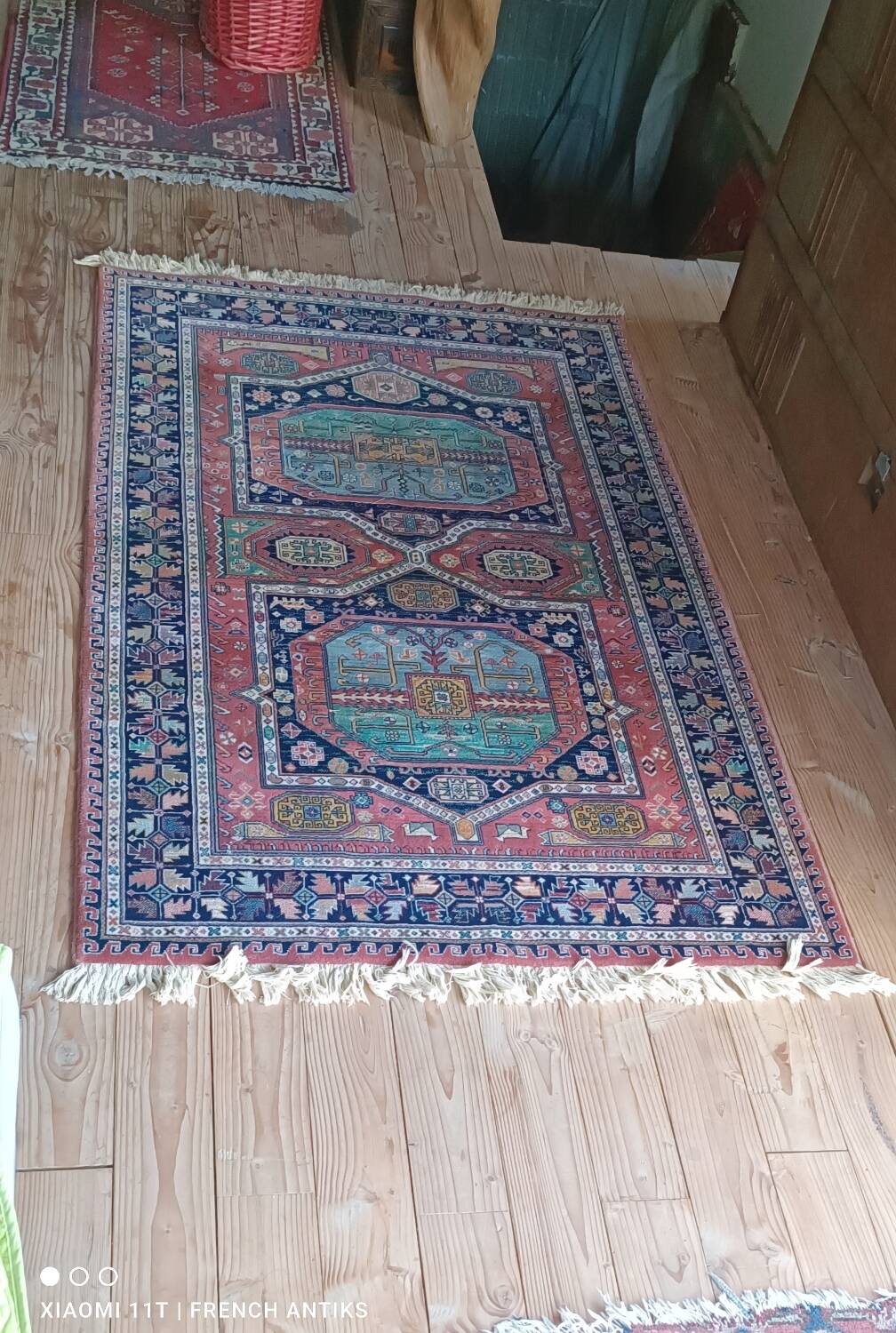 Vintage Iranian Kenareh rug from the 1980s. Handcrafted.