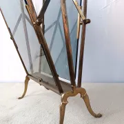 Neo-classical brass magazine rack in the spirit of Maison Jansen.