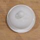 White porcelain butter dish accompanied by its matching bell.