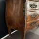 Bordeaux inlaid chest of drawers with marble and bronze ornament