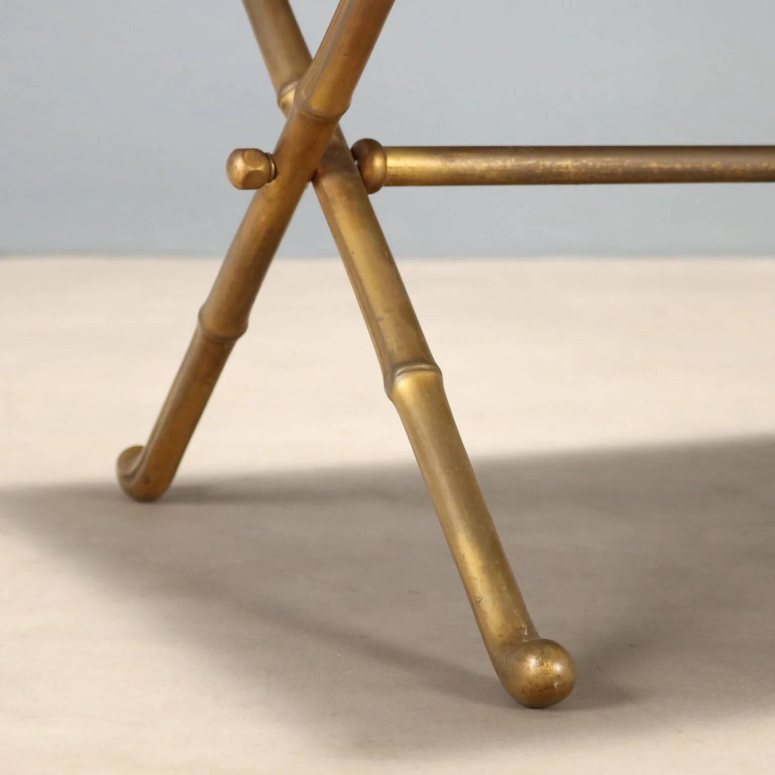 Coffee table from the 1950s-60s with a brass base.