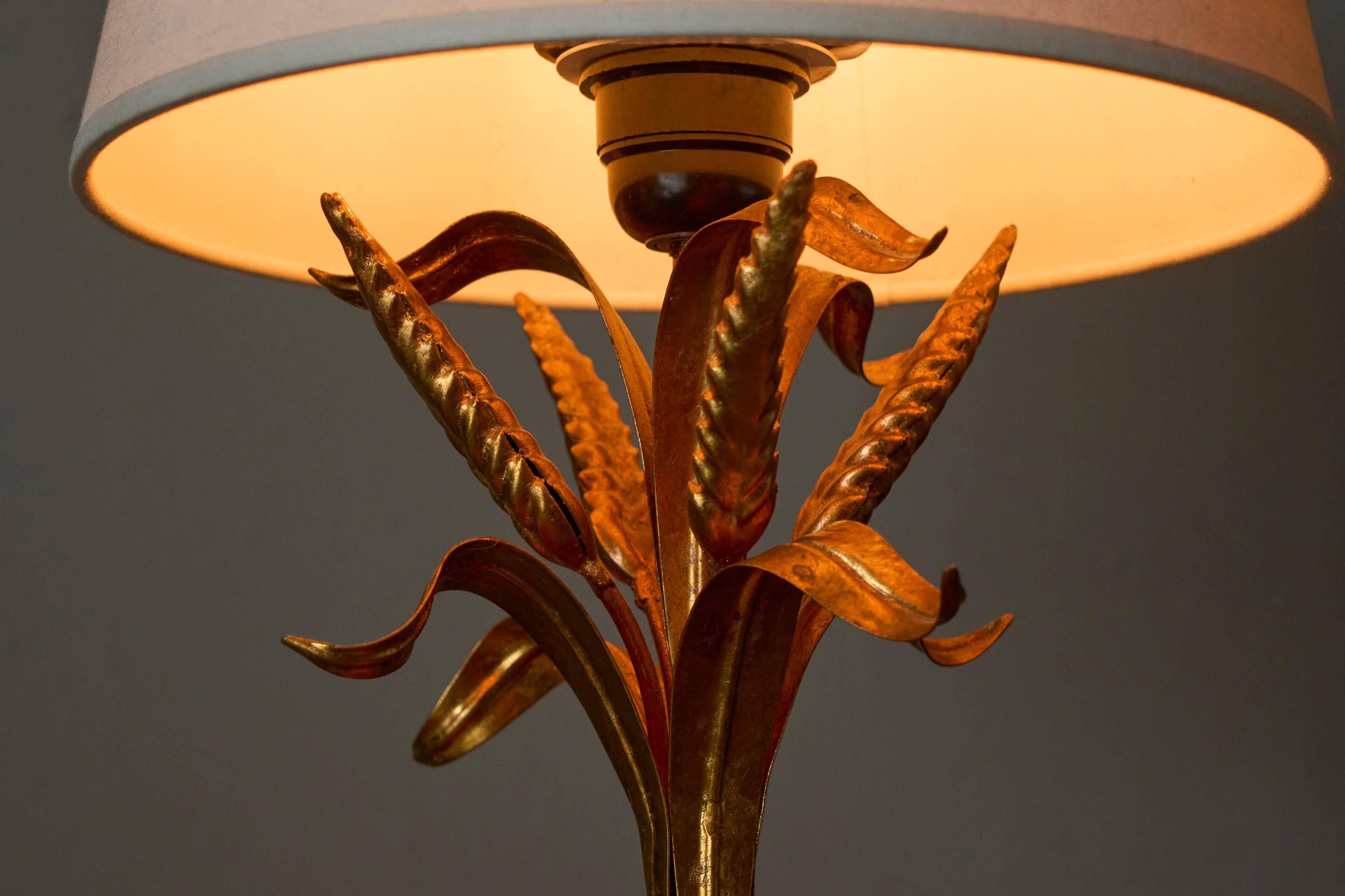 Gold metal table lamp with wheat pattern, mid-20th century.