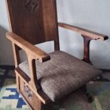 Antique arts and crafts carved oak armchair, 1910