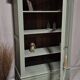 Glass display cabinet with drawer