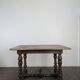 Louis XIII oak table with baluster legs and H stretcher.