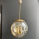 Smoked Glass and Brass Four-Light Suspension Pendant. French Work.