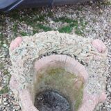 Medicis stone planters with old tree trunk decor