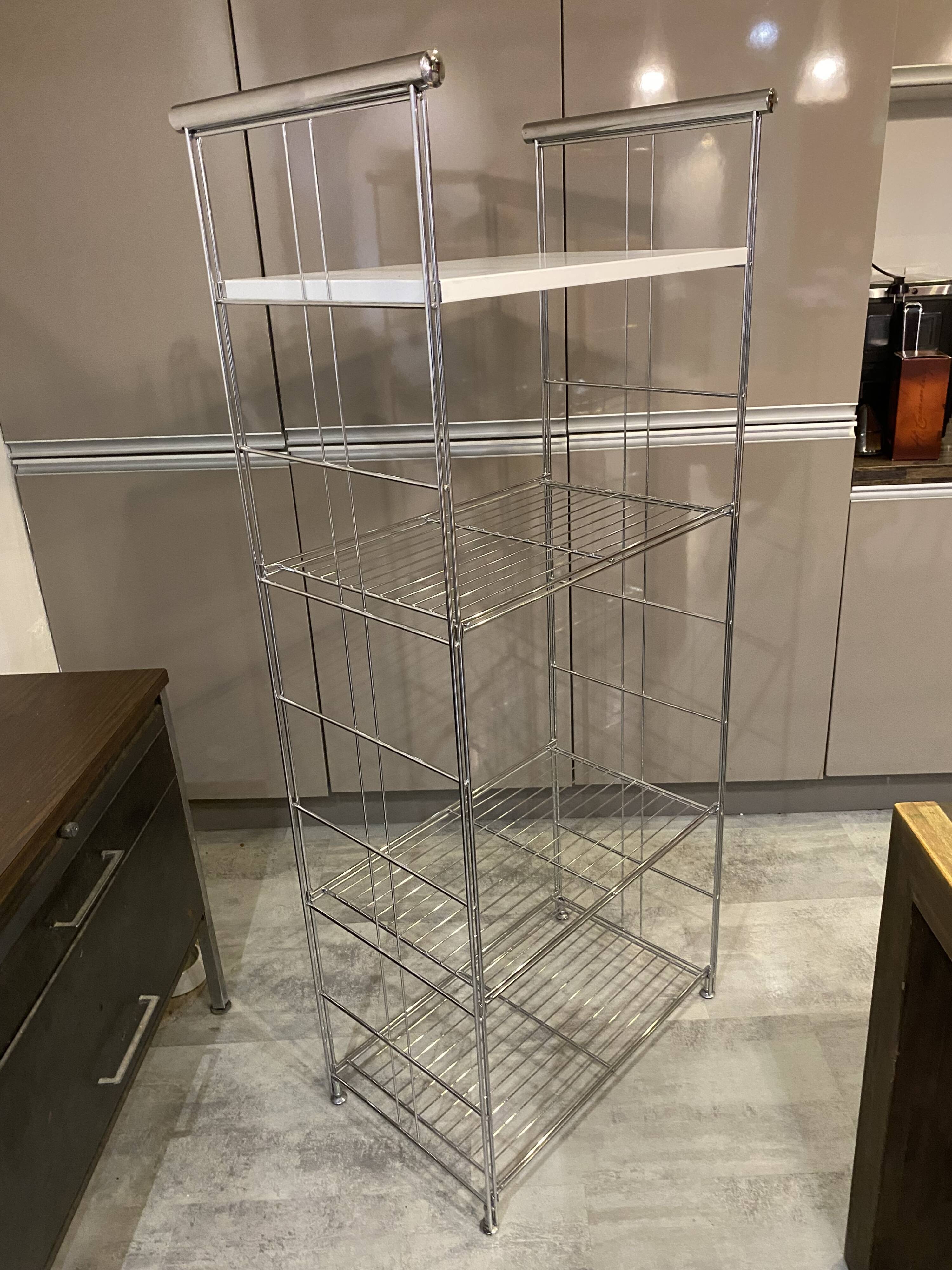 Modular wall bookshelf desk in vintage chrome.