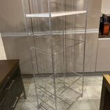 Modular wall bookshelf desk in vintage chrome.