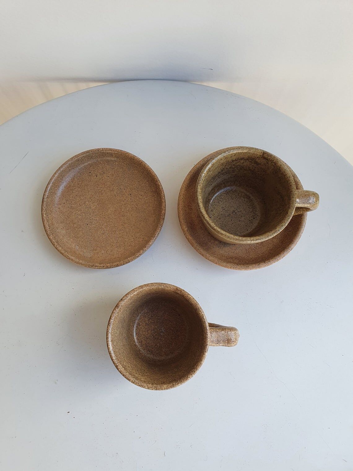Lot of 2 cups and saucers in sandstone