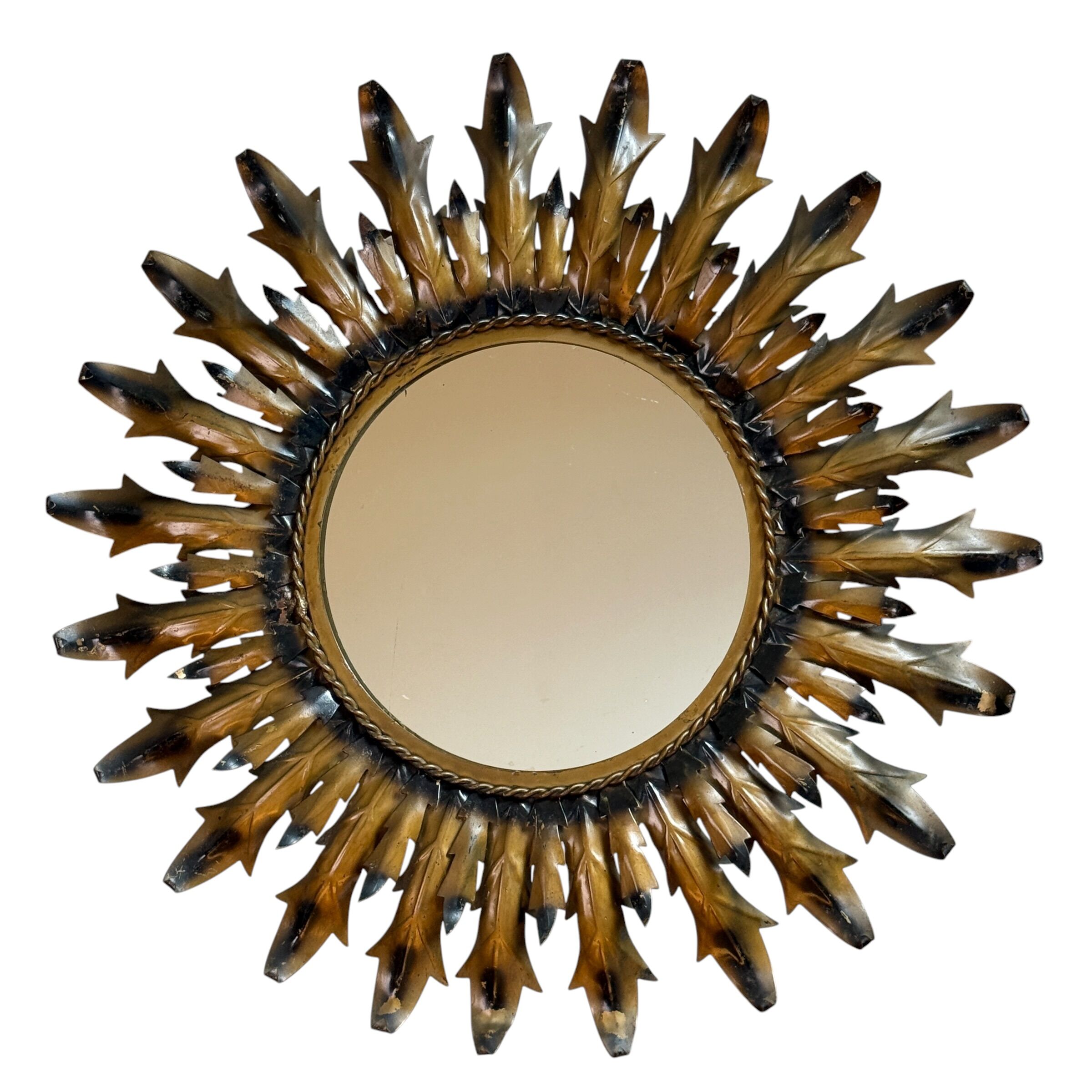 Sun mirror in wrought iron from the 1950s Italy.