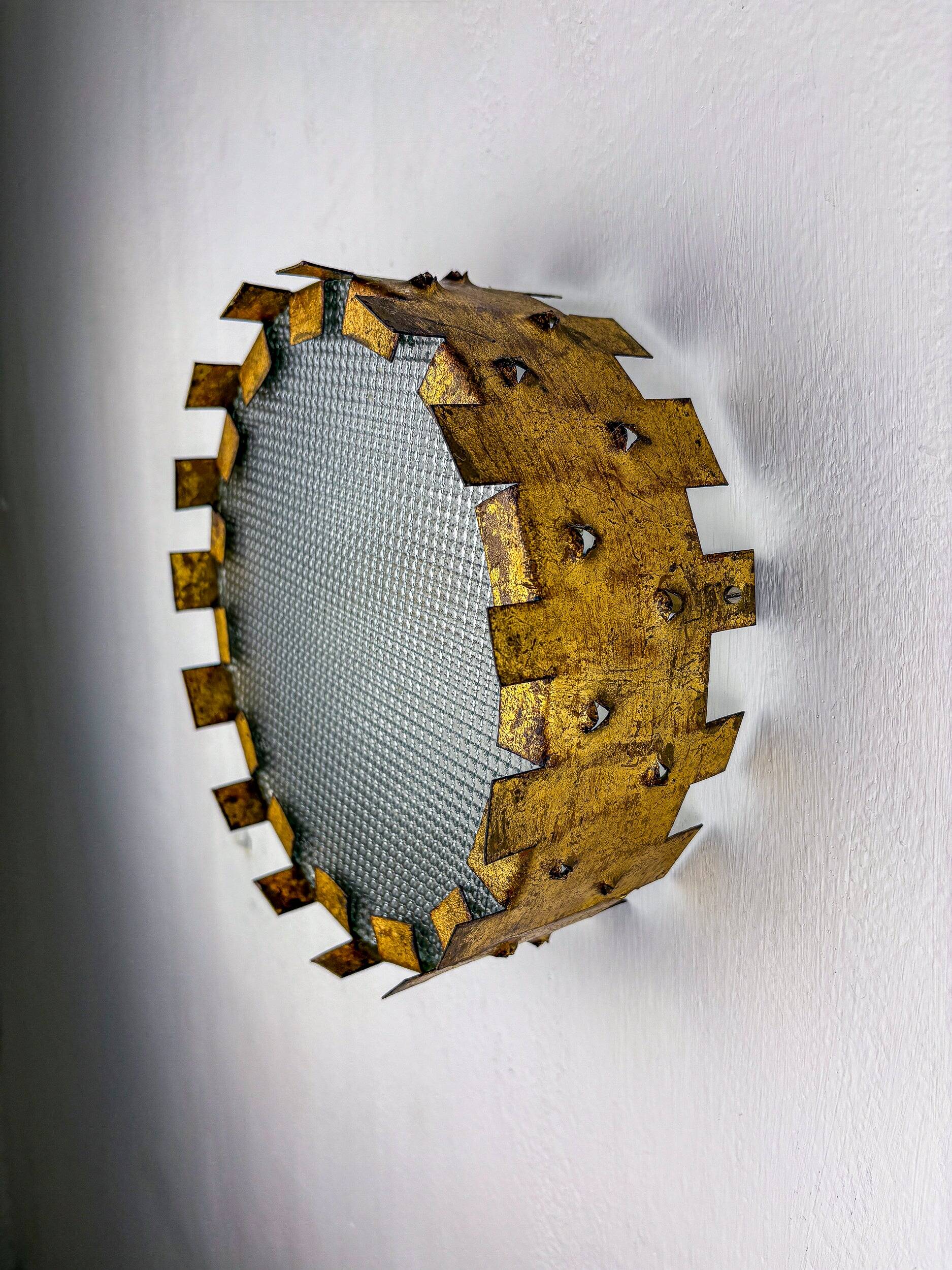 Brutalist crown sunburst fixture in gilt metal and frosted glass, France, 1960s