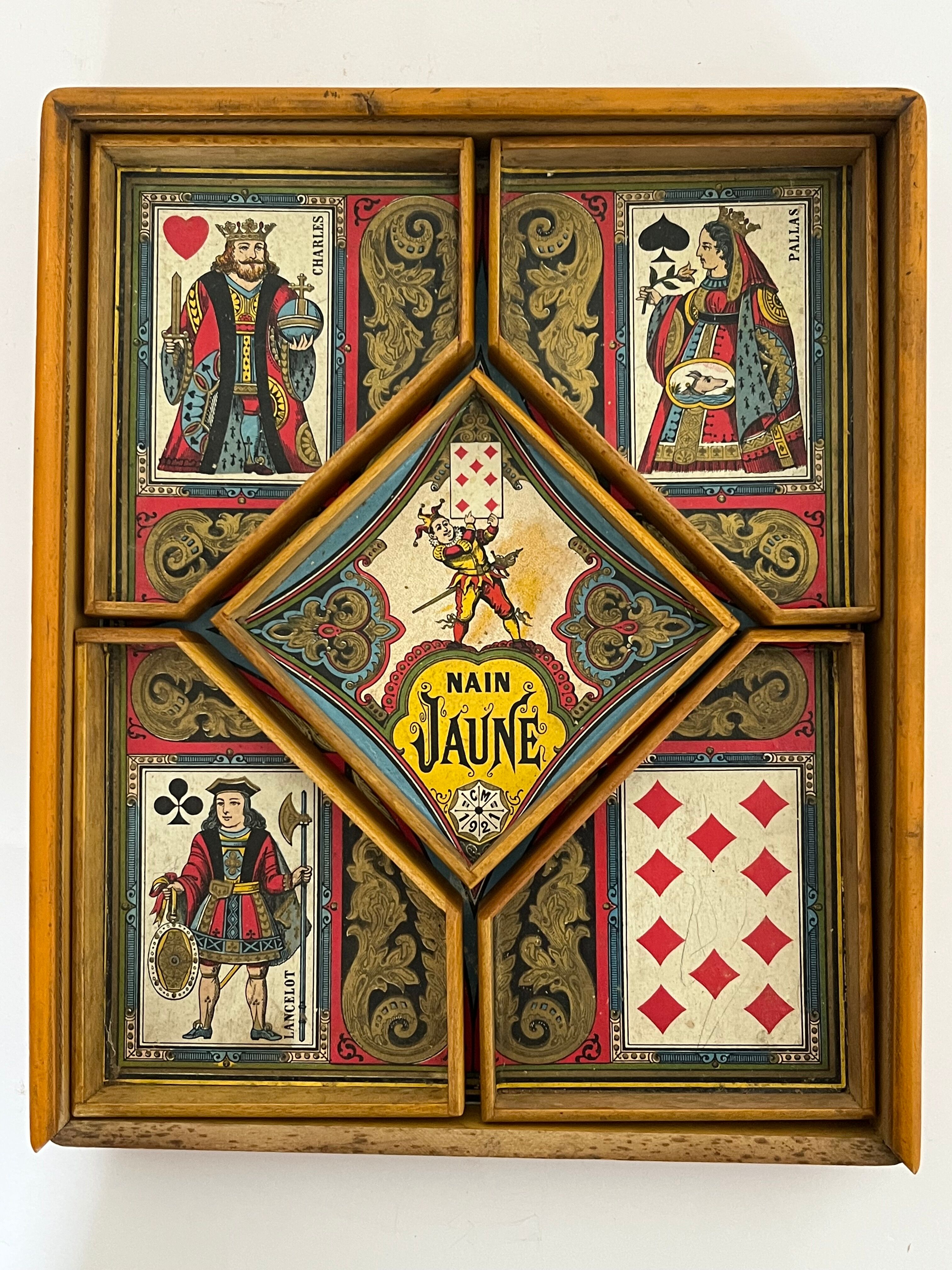Old game of nain jaune with its bone tokens.