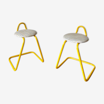 Duo of vintage stools in yellow metal