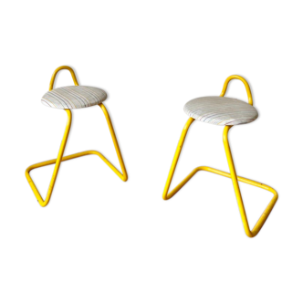 Duo of vintage stools in yellow metal